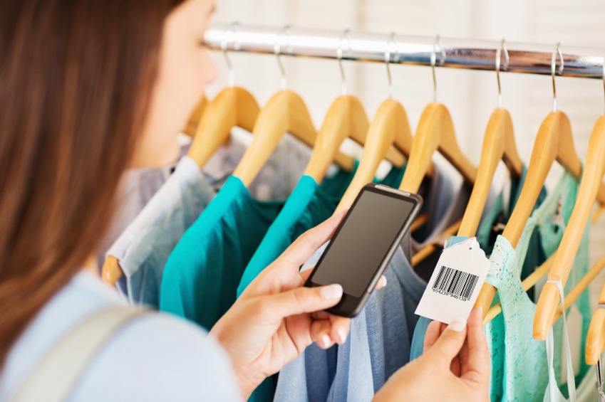 Female Scanning Price Tag Through Smart Phone