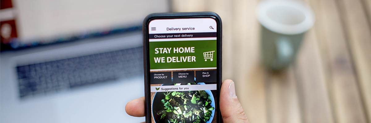 Person ordering food with phone.